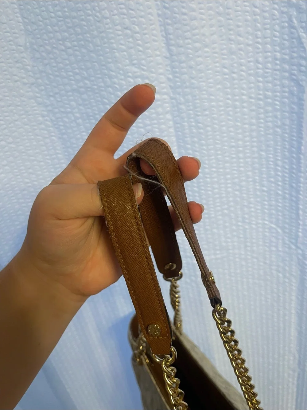 39. Rehab, Michael Kors purse.